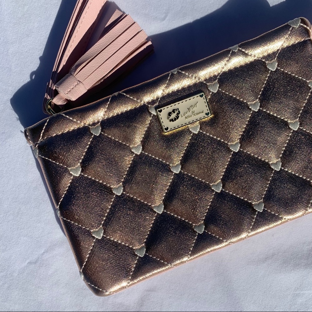 Luv Betsey pink wristlet